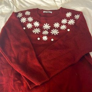 Pretty red sweater with snowflakes